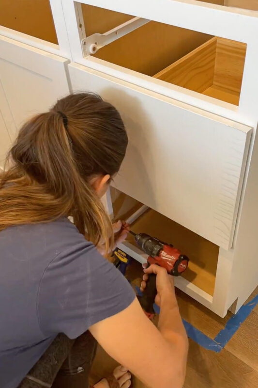 Attaching kitchen cabinets to each other, while building a waterfall kitchen island.